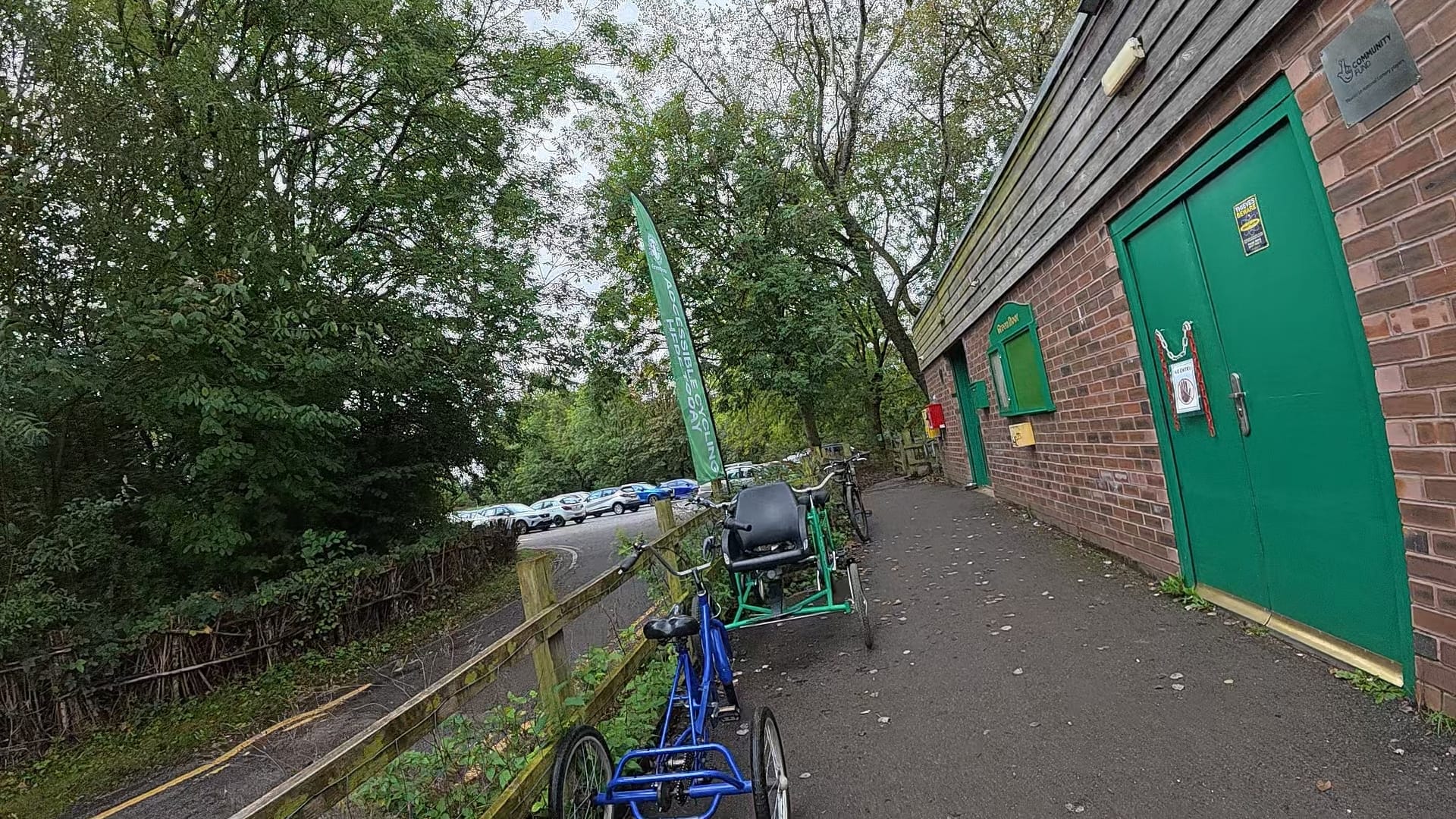 In this picture we can see a trike and a side by side tandem, with a seat at the front for a non-rider