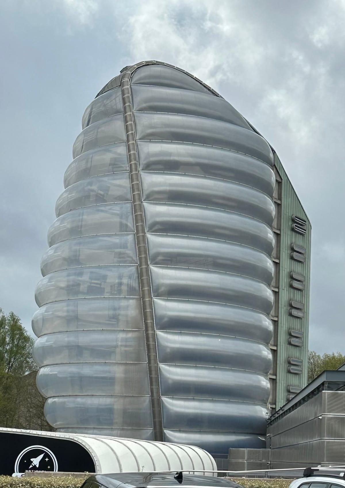 A tall, semi-transparent tower, that to me looks like it is made of strips of bubble wrap.